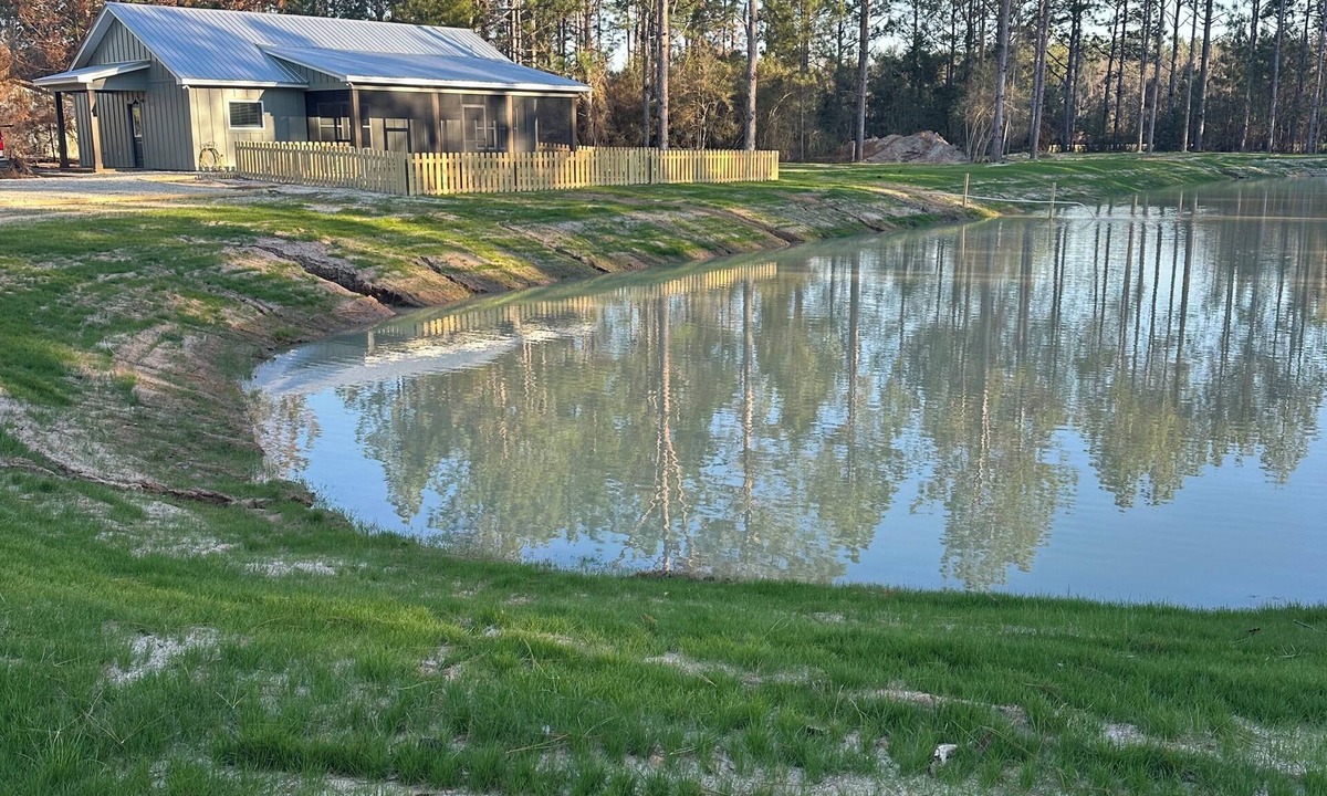 Geneva County Cottage | Brand new, pond front 2-bedroom cottage with AC in delightful Samson