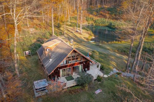 Oliverea Ski Chalet | Hidden Pond -7 Acres with Swimmable Pond Hot Tub & Creek