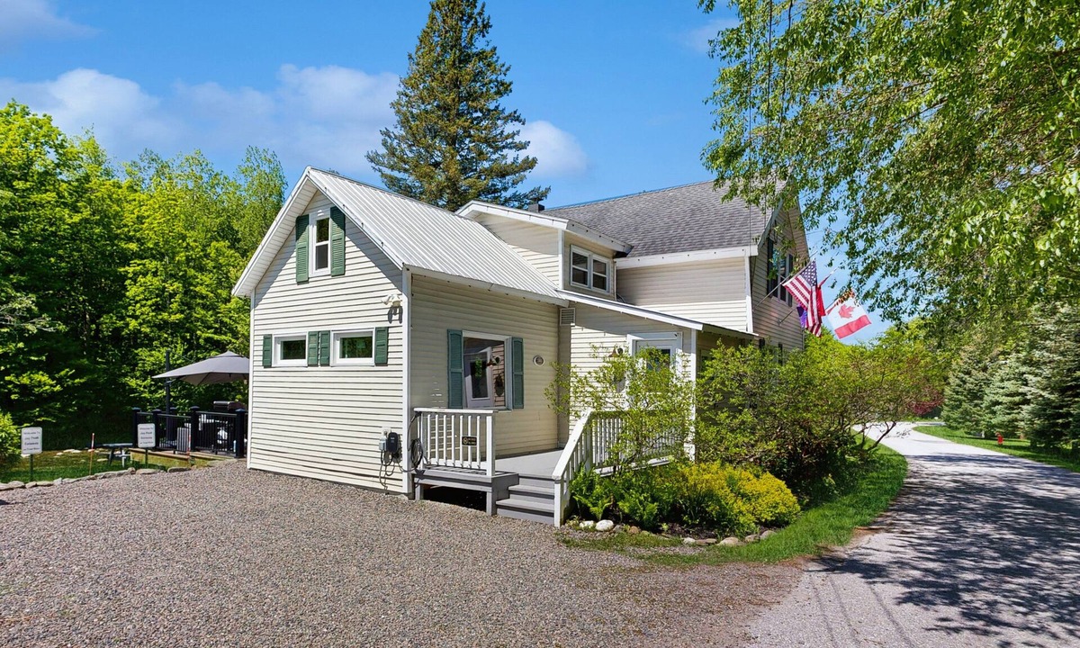 Montgomery Center House | Inviting riverfront home with hot tub on deck & fireplace, near skiing & golf