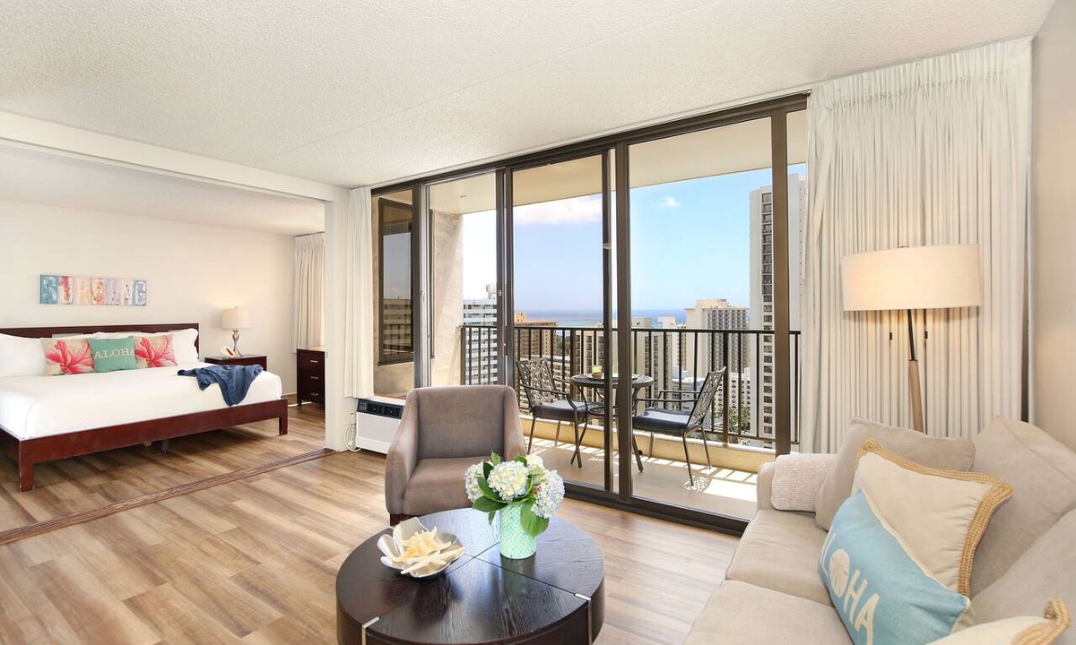 Waikiki Condo | Partial Ocean View, one-bedroom with AC, Wi-Fi, parking, short walk to beach!