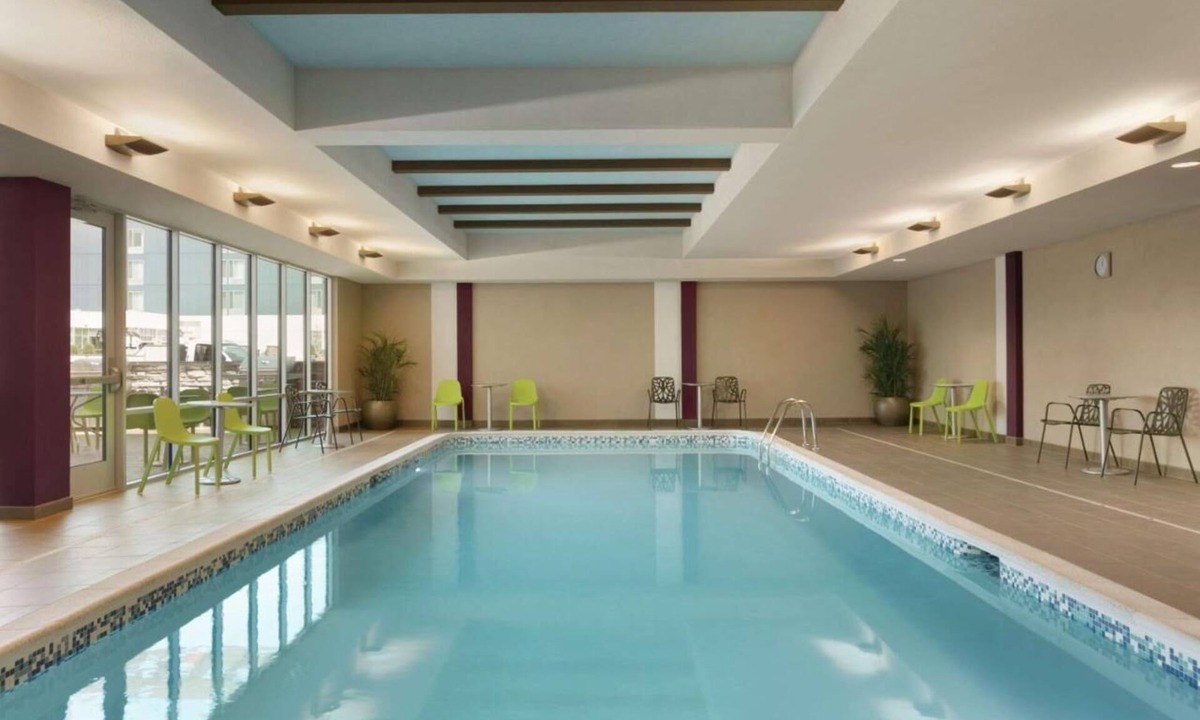 Williamsville Hotel | Rare Find! 2 Convenient Units! Kitchen, Pool, Free Breakfast and Parking!