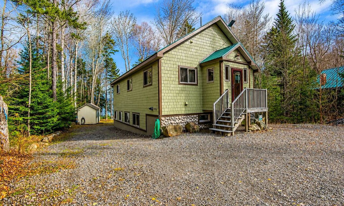 Rangeley Plantation House | The 4 Seasons on Mooselookmeguntic Lake with dock, mooring, 4 kayaks, fire pit, and pet friendly!