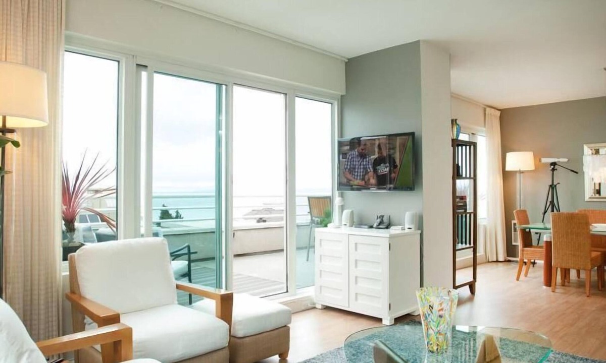 North Beach Condo | WATERFRONT PENTHOUSE. SPECTACULAR VIEWS, DECKS, PRIVACY, QUIET, PARKING, GYM.