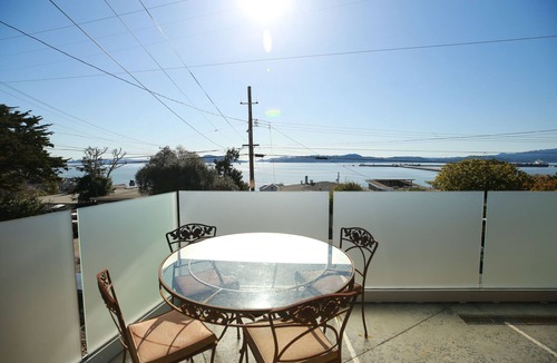 Point Richmond House | A spectacular home with a three bridge view out the Golden Gate.