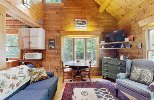Beaver Cove Cabin | Beautiful home with WiFi, lake view, deck, & firepit - walk to beach