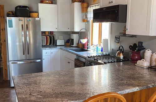 Greenville House | Beautiful lakefront camp with sunset view over big moose mountain