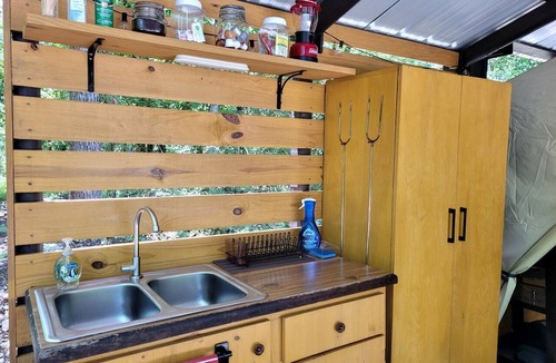 Mid America RV Rental | Black Fox Den: A Woodland Glamp - Dog Friendly in Hot Springs, AR