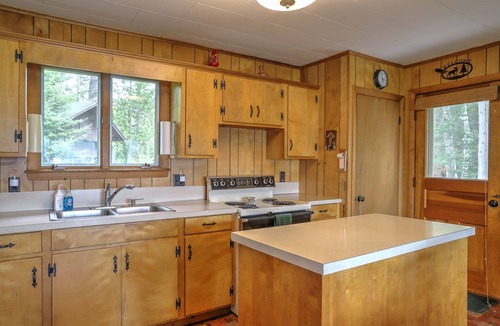 Rangeley Plantation House | Camp Chuck-a-luck | Private Beach, Dock, Kayaks | Dog-Friendly Mooselookmeguntic Lake Cabin