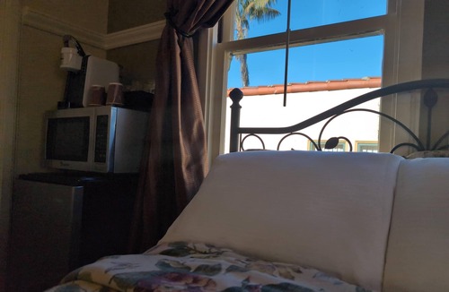Marina District Hotel | Charming Courtyard Retreat with 2 Double Beds – Perfect for Your Stay!