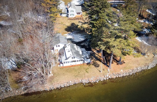 Winthrop House | Cobbossee Hideaway, lakefront property with dock for swimming, fishing, and sunrises