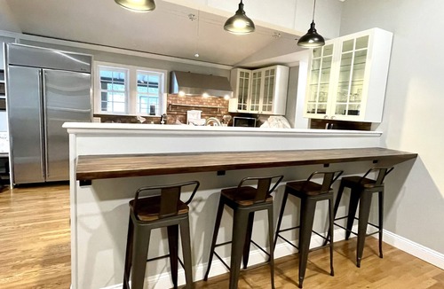 Fort Kent Mills House | Comfort Elevated Hot Tub King Suite Direct Trail Access In Town WiFi