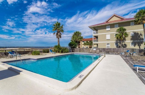Navarre Beach House | Condo with private balcony pool grills central AC & WD