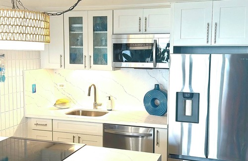 Punaluu Apartment | Cozy oceanfront 1-bedroom condo with WiFi, and access to sandy beach.