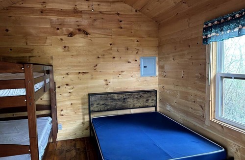 Macedon Cabin | Cozy Rustic Cabin with Fire Ring & Outdoor Seating in Macedon, New York