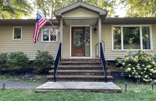 Montoursville House | Creekfront getaway with hot tub and fire pit.