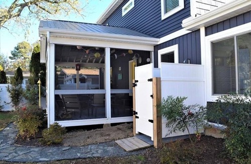 Dodds Addition House | Elegant Coastal Living: Screened-In Porch, Fire Pit, & A Short Walk to the Beach
