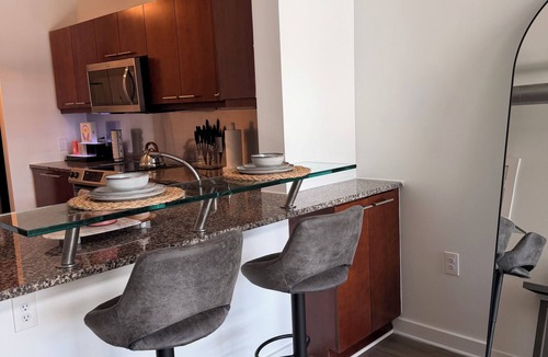 Atlantic Station Area Condo | Exclusive 2-Bed Loft in Atlantic Station—A Unique FIFA Escape.