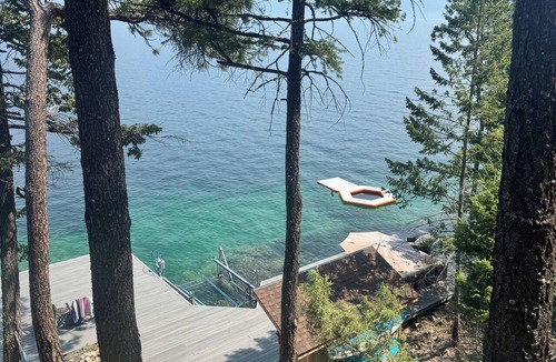 Finley Point Cottage | Finley Point Lakefront Cottage with Dock, Boat Lift, and Treehouse Balcony