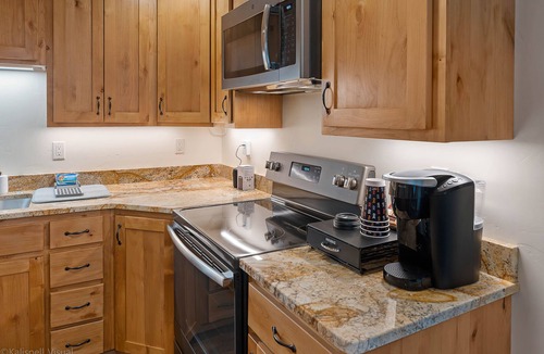 Bigfork Condo | Glieden Lodge Luxury Condo @ The Historical Grand View on Bigfork Bay