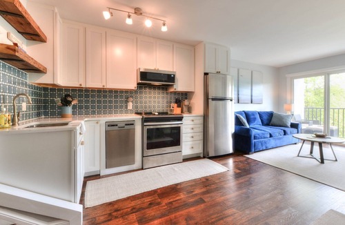 The Pines Condo | Gorgeous renovated property in town & walking distance to the beach & shops