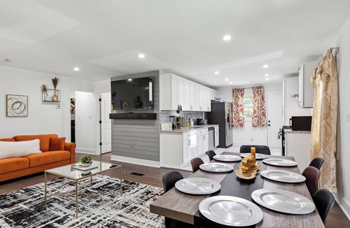East Point House | Grand Five-Bedroom Retreat Close to the Airport
