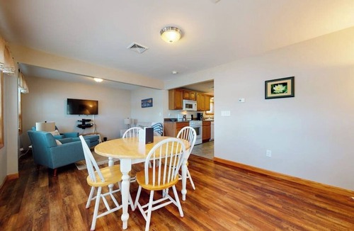 The Bays House | Homey lakeside property w/one house, two cottages, mtn. views, & private beach