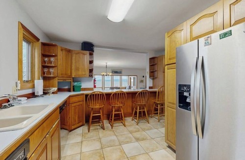 Malletts Bay House | Lakefront home with water access, views of the mountains, private deck & patio