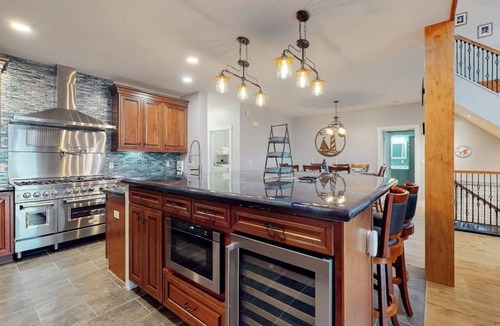 Boothbay House | Luxurious waterfront home with deck, firepit, hot tub, fireplace, & pool table
