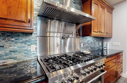 Boothbay House | Luxurious waterfront home with deck, firepit, hot tub, fireplace, & pool table