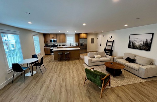 Montgomery Apartment | Luxury New 1BR 950 sq ft apartment. Sleeps 4. Stocked Kitchen, 2 Tvs, Parking.