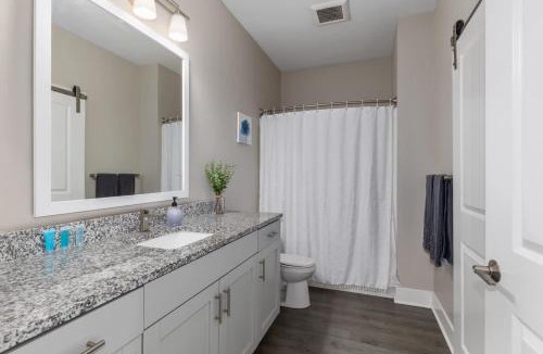 Grandville House | Modern 2BR & 2BA Condo with Garage & Patio