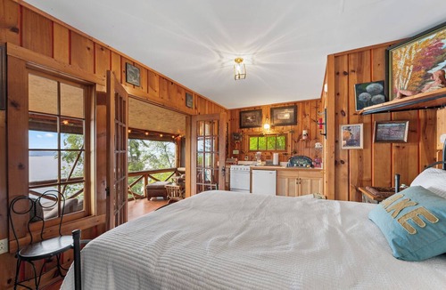 Finley Point Cabin | New! Private Lakeside Cabin | Screened Porch, Beach & Dock on Flathead Lake | Polson, MT