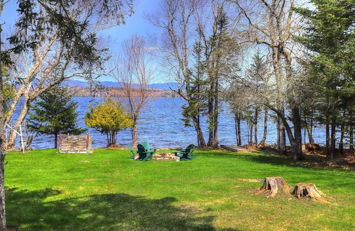 Rangeley Plantation Cabin | Niboban Cabin 5 right on Rangeley Lake with a screened porch, fire pit, hammock, WiFi and dock!
