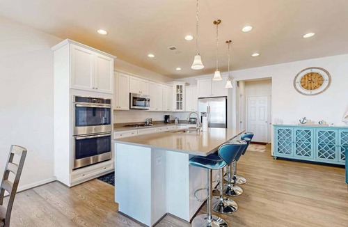 Frankford House | Ocean View Beach Club house with shared pool, sports courts, & gym