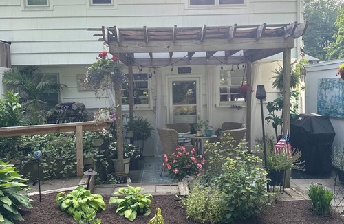 Fairfield House | Open layout 3-bedroom home in Fairfield. Serene backyard, fireplaces, hot tub.