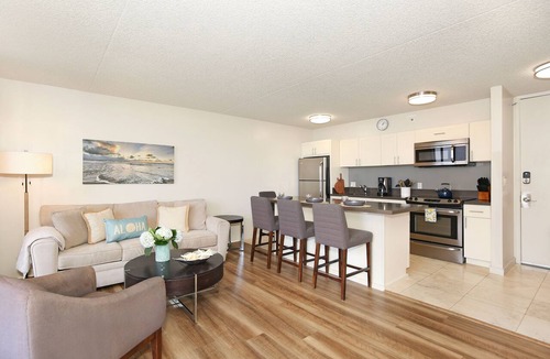Waikiki Condo | Partial Ocean View, one-bedroom with AC, Wi-Fi, parking, short walk to beach!