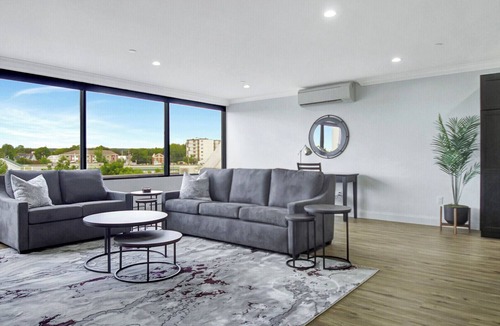 Waterville Apartment | Penthouse 1-bedroom corporate apartment in Downtown Waterville!