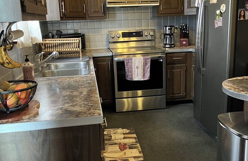 Lorenz Park House | Pet friendly 3-bedroom. About a mile from downtown. Fenced-in backyard.