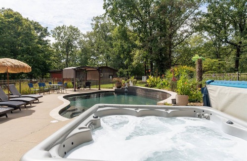 Wilburn House | POOL with waterfall.Fenced yard! Fire pit, Hot tub, big deck and big fish!