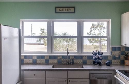 Alligator Point House | Private beach and Bay with a Dock. Ground Level home, Ocean front property