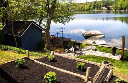 Bath House | Quiet Lakefront Cabin · Private Dock and Firepit