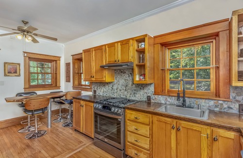 Gardiner House | Riverfront stone cottage Private dock & boats Personal spa private resort