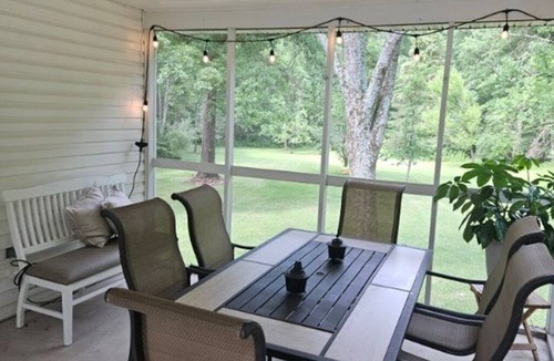 Laurelton House | Secluded 4-Bedroom cabin on wooded waterfront property adjoining Penn's Creek.