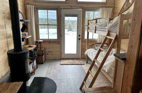 Polebridge House | Secluded Off-Grid Cabin with Glacier Park Views and Wall Tents near Polebridge, Montana