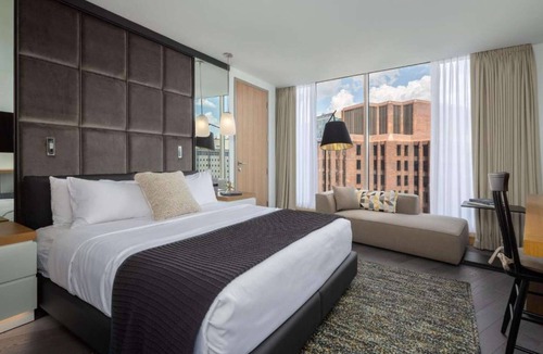 Logan Square Hotel | Skyline Pool Access with Skydeck + Fitness Room