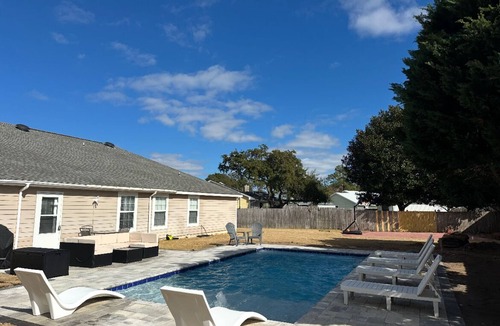 Palm Bay House | Spacious 4-bedroom house in Panama City Beach with a Pool, WiFi, & Game Room!