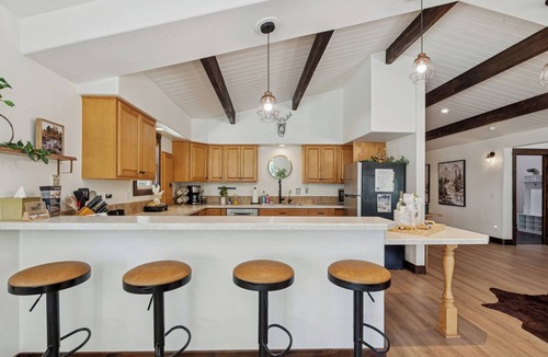 Lakeside House | Spacious 7-Bed Home w/Hot Tub, Fireplace, Gym, Wine Bar, and 2 Living Spaces!
