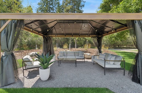 Lakeside House | Spacious 7-Bed Home w/Hot Tub, Fireplace, Gym, Wine Bar, and 2 Living Spaces!