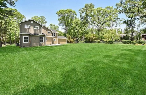 Plainview House | Stunning 5 Bedroom Retreat with 3 Baths and Expansive Heated In-Ground Pool