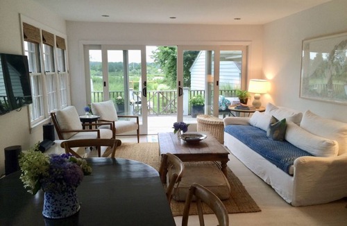 Noyack House | Stunning Waterfront Home with Pool, Boat Dock, and Acre of Land
